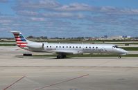 N902BC @ KORD - EMB-145LR - by Mark Pasqualino