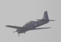 ZF243 - Photographed flying over Lofthouse, N. Yorks. Silhoutted against sky: but digital enhancement revealed fuselage markings. - by Kevin King