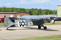 G-BKHG @ EGSU - Under tow at Duxford. - by Graham Reeve