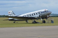 N33611 @ EGSU - (Clipper Tabitha May), 1945 Douglas DC-3C at Duxford receiving some attention to the port engine. - by moxy