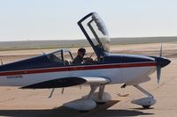 N103MB - Ken on the ground La Junta - by Mike Kahler