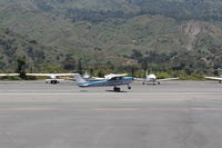 N704JH @ SZP - 1976 Cessna 150M, Continental O-200 100 Hp, landing roll Rwy 22 - by Doug Robertson