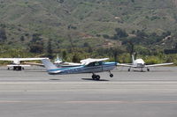N704JH @ SZP - 1976 Cessna 150M, Continental O-200 100 Hp, landing roll Rwy 22 - by Doug Robertson