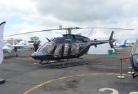 G-JGXP @ EGTB - Bell 407 GXP at Wycombe Air Park. Ex OK-HRN - by moxy