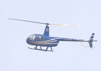 G-TUNL - Bearing its new registration and sporting a new livery over Potters Bar, Herts. - by Chris Holtby