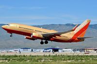 N714CB @ KBOI - Take off from RWY 28L. Just a few of the old classic paint jobs left.