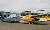 N7064D @ CFA4 - At a Canadian Owners and Pilots Association fly-in at CFA4 after 2 days of exploring the area around Carcross, Yukon, with the R22. - by Murray Lundberg