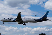 9K-AOH @ EGLL - Landing RWY 27L - by DominicHall