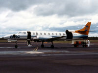 VH-EEF @ YBUD - Bush Pilot Airways (BPA) Metro II VH-EEF Cn TC331E (with all doors open) about to be loaded with passengers’ baggage at Bundaberg Airport YBUD in August 1989. (Low Res photo). - by Walnaus47