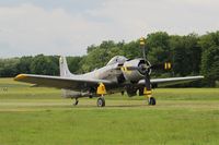 F-AZFN @ LFFQ - Douglas AD-4N Skyraider, Taxiing to parking area, La Ferté-Alais airfield (LFFQ) Airshow 2015 - by Yves-Q