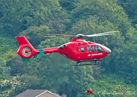 G-HEMN - Taking off from Aberystwyth Hospital landing site.