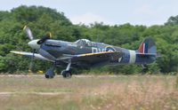 G-IBSY @ EGFH - Spitfire arriving Runway 22. Marked EE602/DV-V. - by Roger Winser