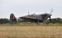 G-IBSY @ EGFH - Spitfire marked EE602/DV-V departing Runway 04. - by Roger Winser