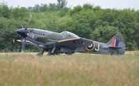 G-SPIT @ EGFH - Spitfire marked MV268/JE-J arriving Runway 22. - by Roger Winser