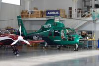 N365A @ KJVL - At Helicopter Specialties - by Glenn E. Chatfield
