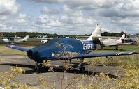 G-BDFW @ EGLK - Covered and stored outside at Blackbushe but not weathering too well and deteriorating. - by Chris Holtby