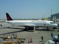 C-FZQS @ CYUL - Loading passengers at YUL - by butlermatt