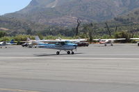 N704JH @ SZP - 1976 Cessna 150M, Continental O-200 100 Hp, landing roll Rwy 22 - by Doug Robertson