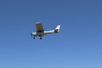 N704JH @ SZP - 1976 Cessna 150, Continental O-200 100 Hp, on final Rwy 22-doing pattern work today. I walk the entire airport, often on the move. - by Doug Robertson