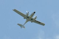 G-FFMV @ EGFP - DA-42 over the airport. - by Roger Winser