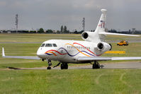 F-WFBW @ LFPB - Front Port-side view of First-Built Dassault Falcon 7X F-WFBW taxying out to the main runway at LBG/LFPB on Friday 24Jun2011. Photo taken at the 49th Salon International - Paris Air Show at Le Bourget. Note the thrust reverser on No 2 Engine is still open - by Walnaus47