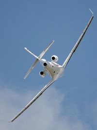 F-WFBW @ LFPB - Rear view of the sleek lines of First Built Dassault Falcon 7X F-WFBW over LBG/LFPB on Friday 24Jun2011. Photo taken at the 49th Salon International - Paris Air Show at Le Bourget. This is Falcon 7X Construction Number 1. - by Walnaus47