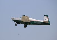 N9244M @ KOSH - Mooney M20E - by Mark Pasqualino