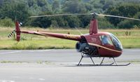 G-EMAC @ EGFH - Resident R-22, the latest addition to HeliAir Wales. - by Roger Winser