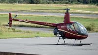G-EMAC @ EGFH - Resident R-22, the latest addition to HaliAir Wales - by Roger Winser