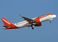 OE-ICZ @ LEBL - Taking off from rwy 25L - by Shunn311