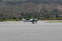 N704UT @ SZP - 1976 Cessna 150M, Continental O-200 100 Hp, landing roll Rwy 22 - by Doug Robertson