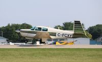 C-FCXY @ KOSH - Mooney M20E - by Mark Pasqualino