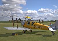 G-ANFM @ EGTH - 1940 Tiger Moth being turned ready for taxiing at the Old Warden 'Gathering of Moths' Day 2019 - by Chris Holtby