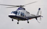 G-DGUN @ EGFH - Visiting AW-109SP. - by Roger Winser