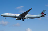 C-GHKX @ EGLL - Landing RWY 27R - by Dominic Hall