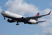 N155DL @ EGLL - Landing RWY 27R - by Dominic Hall