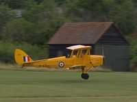G-ANKZ @ EGTH - 1938 Tiger Moth taking off at the Gahering of Moths Day 2019 at Old Warden - by Chris Holtby