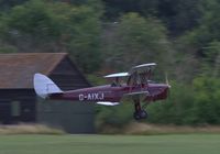 G-AIXJ @ EGTH - 1942 Tiger Moth taking off at the Gathering of Moths Day 2019 at Old Warden - by Chris Holtby