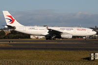 B-5952 @ YSSY - as MU712 to HGH - by Bill Mallinson