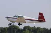 N9744M @ KOSH - Mooney M20C - by Mark Pasqualino