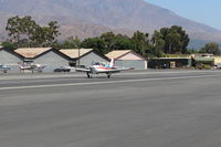 N7960K @ SZP - 1964 Beech 35-B33 DEBONAIR, Continental IO-470K 225 Hp, landing roll Rwy 22 - by Doug Robertson