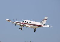 D-INFO @ KOSH - Piper PA-31T2 - by Mark Pasqualino