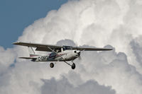 C-GMGI @ CYXX - Landing - by Guy Pambrun