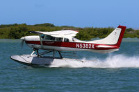N5382X @ PHNL - Landing in lagoon beside PHNL - by Erik Frikke