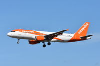 G-EZWF @ EGKK - Landing at Gatwick. - by Graham Reeve