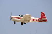 N5726Q @ KOSH - Mooney M20C - by Mark Pasqualino