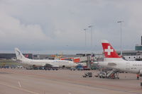 HB-JCH @ EHAM - With B737-405 SX-MAH..