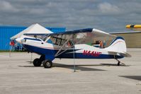 N44NF @ KGBG - Parked on the ramp. - by Glenn E. Chatfield