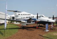 N399WM @ KOSH - Beech B200 - by Mark Pasqualino