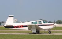C-FKWI @ KOSH - Mooney M20F - by Mark Pasqualino